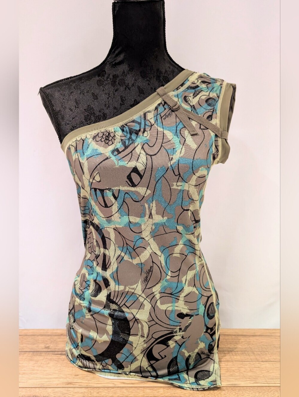 Apple Bottoms One-Shoulder Abstract Print Shirt in Olive Green & Blue
